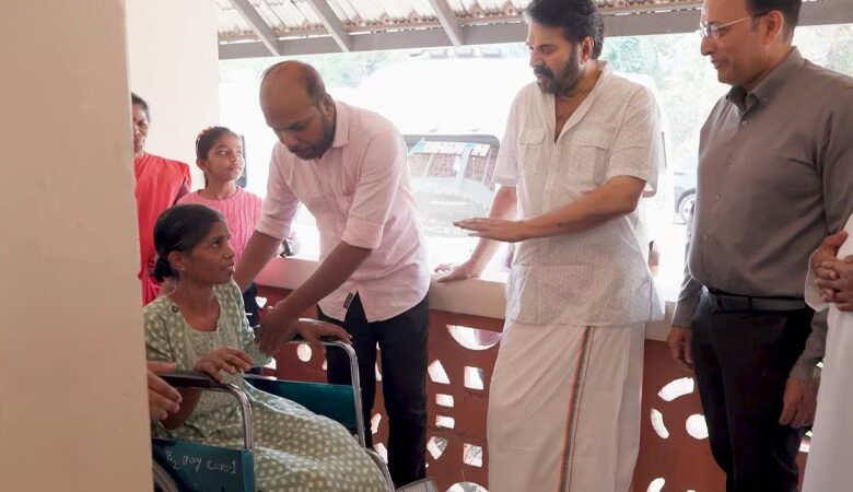 Megastar Mammootty holding the hand of Adimali landslide survivor Sandhya at Rajagiri Hospital